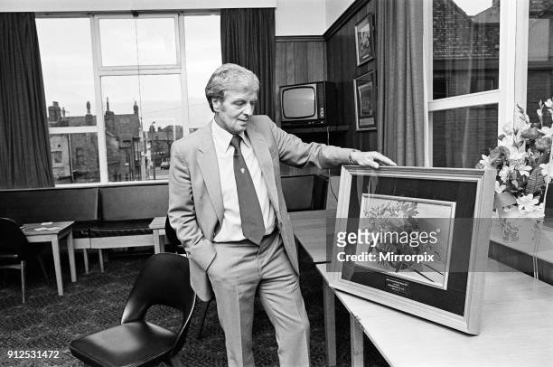 John Neal, Manager, Middlesbrough Football Club, Pictured at his office, Ayresome Park, 12th August 1980. Admiring Japanese Painting.