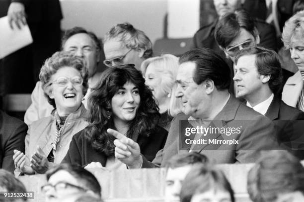 Robert Maxwell and his daughter Ghislaine watch the Oxford v Brighton football match, 13th October 1984.