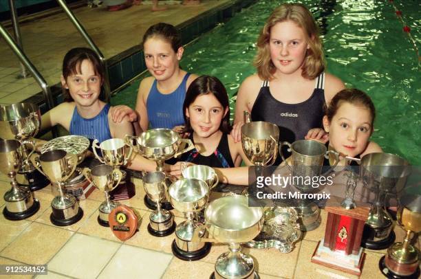Swimmers from Deepdale in Guisborough swept the board at the Guisborough Swimming Gala. With their trophies are, left- right, front Kelly and Robyn...