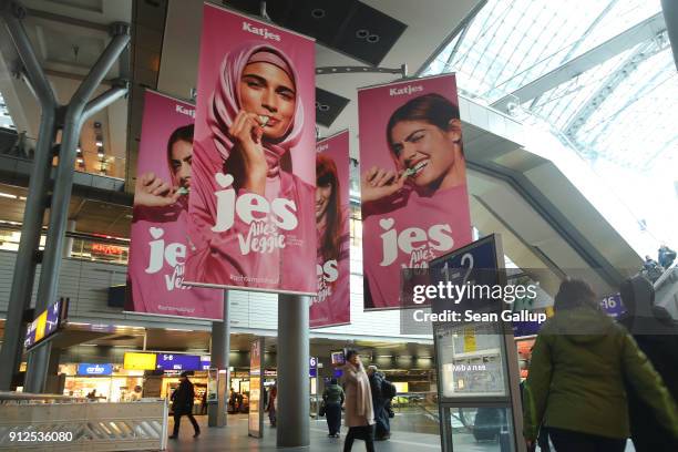 Advertisements for a new line of vegetarian sweets by German candymaker Katjes feature a Muslim woman wearing a headscarf and three non-covered women...