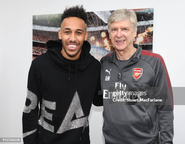 Arsenal manager Arsene Wenger with new signing Pierre-Emerick Aubameyang at London Colney on January 31, 2018 in St Albans, England.