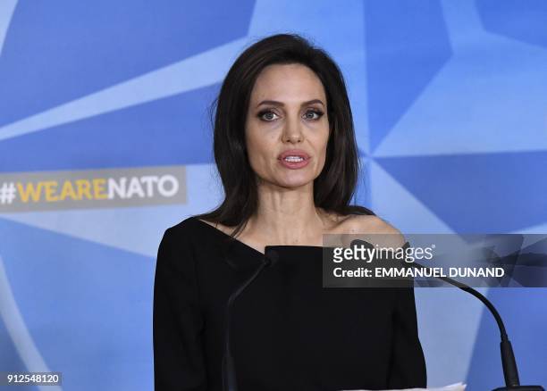 Actress and Special Envoy for the United Nations High Commissioner for Refugees Angelina Jolie addresses a press conference at the NATO Headquarters...