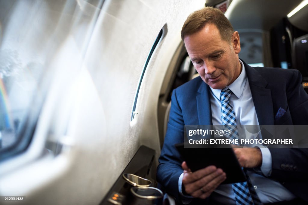 Man in private jet airplane