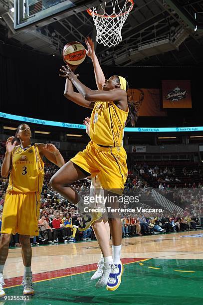 DeLisha Milton-Jones of the Los Angeles Sparks shoots a layup in Game Three of the Western Conference Semifinals against the Seattle Storm during the...