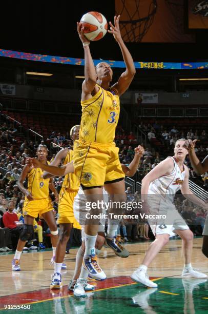 Tina Thompson of the Los Angeles Sparks goes up for a shot in Game Three of the Western Conference Semifinals against the Seattle Storm during the...