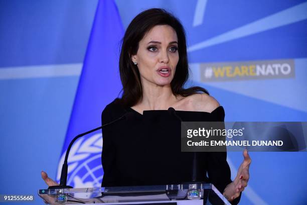 Actress and Special Envoy for the United Nations High Commissioner for Refugees Angelina Jolie addresses a press conference at the NATO Headquarters...