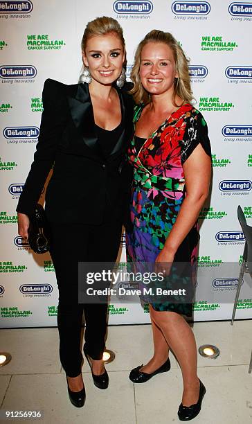 Katherine Jenkins and guest attend the Macmillan De'Longhi Art Auction 2009 at The Avenue on September 29, 2009 in London, England.