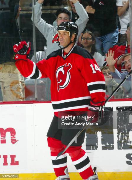 Brendan Shanahan of the New Jersey Devils pumps his fist in celebration of his 3rd period goal against the New York Islanders at the Prudential...