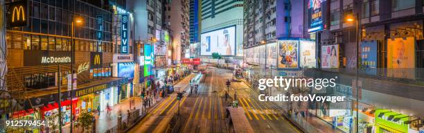 hong kong causeway bay busy shopping street neon night panorama - causeway bay stock pictures, royalty-free photos & images