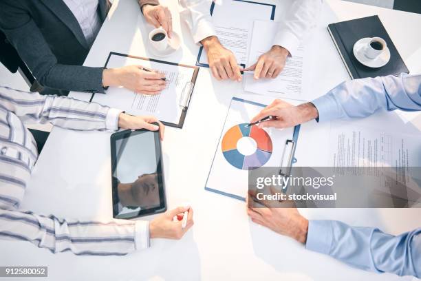 business people at meeting - shareholder's meeting stock pictures, royalty-free photos & images