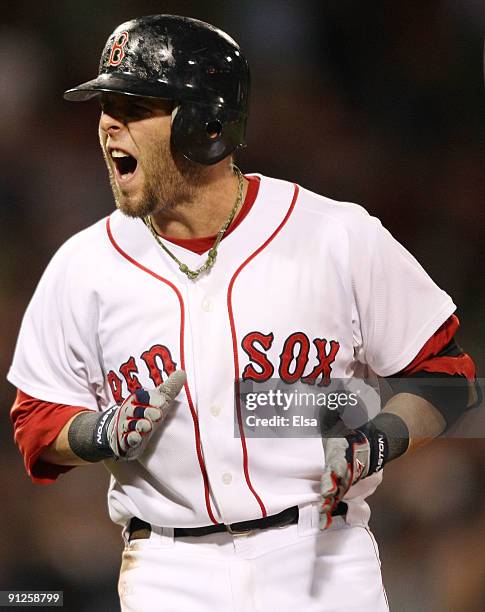 Dustin Pedroia of the Boston Red Sox reacts after flying out in the ninth inning against the Toronto Blue Jays on September 29, 2009 at Fenway Park...