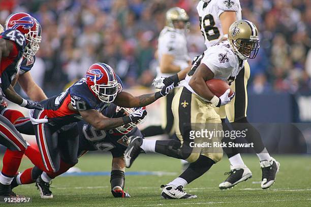 Jabari Greer of the New Orleans Saints carries the ball during the game against the Buffalo Bills at Ralph Wilson Stadium on September 27, 2009 in...