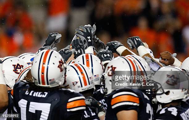 The Auburn Tigers huddle after pregame warmpus before facing the West Virginia Mountaineers at Jordan-Hare Stadium on September 19, 2009 in Auburn,...