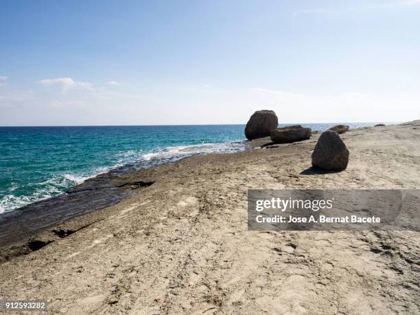 rocky coast of the cabo de gata with formations of volcanic rock of white color.  cabo de gata - nijar natural park, cala del plomo, biosphere reserve, almeria,  andalusia, spain - biosphere planet earth stock pictures, royalty-free photos & images