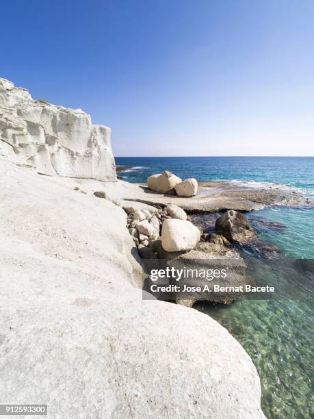 rocky coast of the cabo de gata with formations of volcanic rock of white color.  cabo de gata - nijar natural park, cala del plomo, biosphere reserve, almeria,  andalusia, spain - biosphere planet earth stock pictures, royalty-free photos & images
