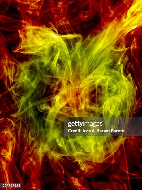 background of forms and abstract figures of smoke of color red and yellow on a light blue background. - yellow light effect stock pictures, royalty-free photos & images