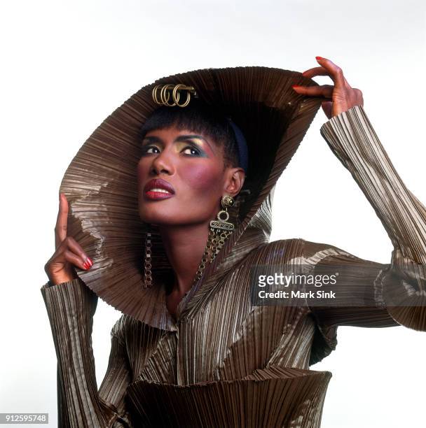 Singer and actress Grace Jones poses for a portrait wearing an Azzendine Alaia creation on August 25th, 1989 in New York City, New York.