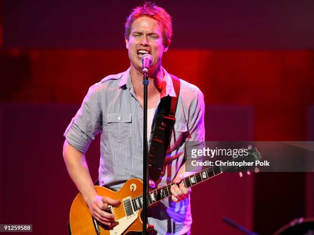 Musician Jonny Lang performs onstage during the Rock A Little, Feed Alot benefit concert held at Club Nokia on September 29, 2009 in Los Angeles,...