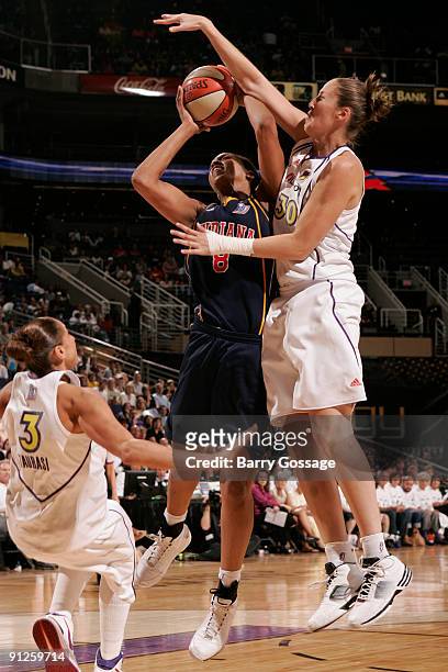 Nicole Ohlde of the Phoenix Mercury blocks a shot by Tammy Sutton-Brown of the Indiana Fever in Game one of the WNBA Finals played on September 29,...