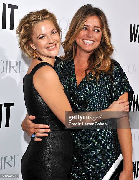 Actress/director Drew Barrymore and executive producer Nancy Juvonen arrive on the red carpet at the Los Angeles premiere of "Whip It" at the...