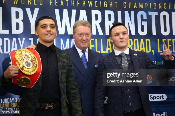 World Featherweight Champion Lee Selby fight promoter Frank Warren and challenger Josh Warrington pose for a photo during the press conference in the...