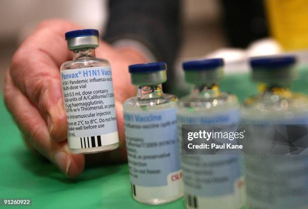 Vile of Panvax H1N1 Vaccine is displayed during the launch of the National pandemic influenza vaccination campaign by the Minister for Health and...