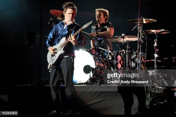 Matt Bellamy and Dominic Howard of Muse perform on stage at FedExField on September 29, 2009 in Landover, Maryland.