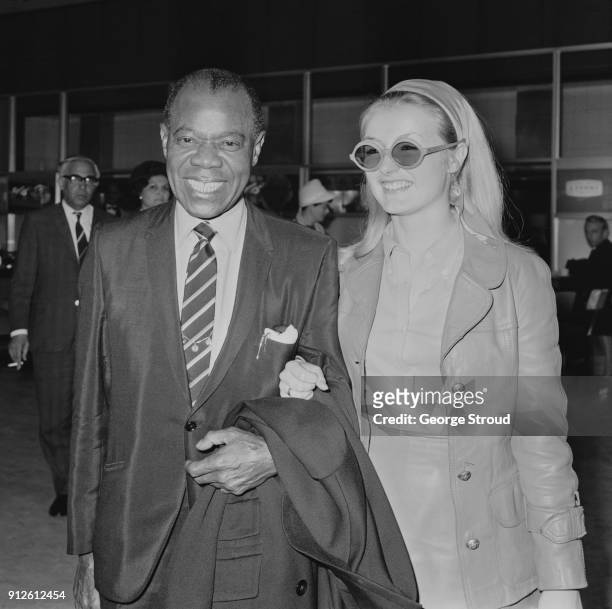 American trumpeter Louis Armstrong at Heathrow Airport, London, UK, 6th July 1968.