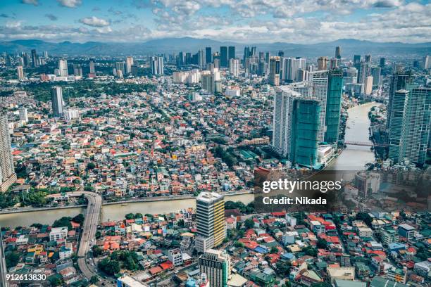 vista sobre el horizonte de makati, metro manila - filipinas - philippines fotografías e imágenes de stock