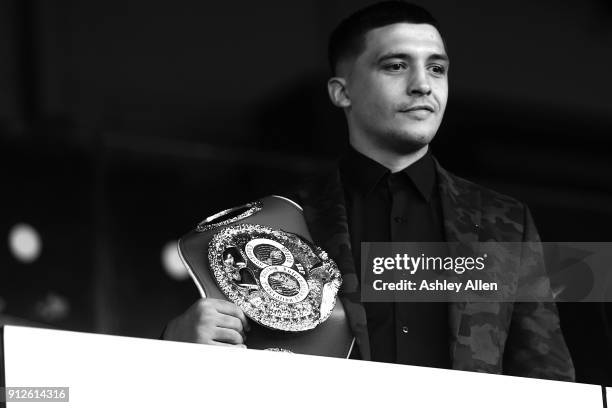 World Featherweight Champion Lee Selby has a look at Elland Road's pitch during a press conference in the Norman Hunter Suite at Elland Road on...