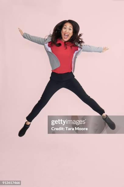 business woman jumping - ecstatic asian stock pictures, royalty-free photos & images