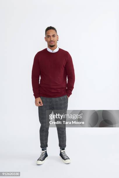 young man standing - maglione foto e immagini stock