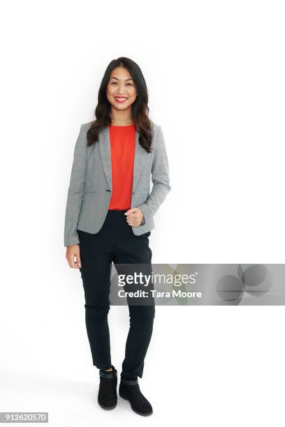 business woman jumping - woman white background stock-fotos und bilder