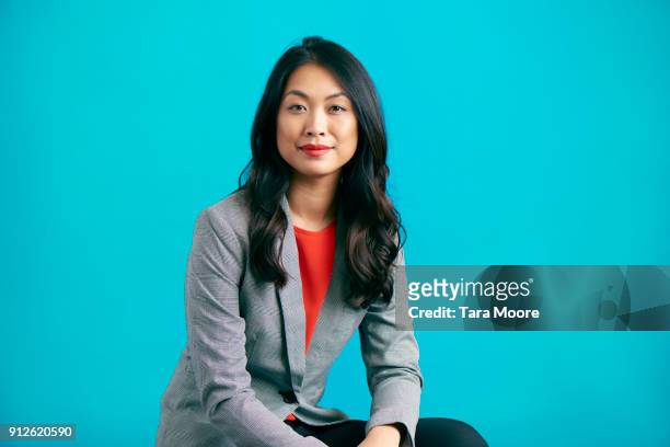 business woman jumping - woman studio shot stock pictures, royalty-free photos & images