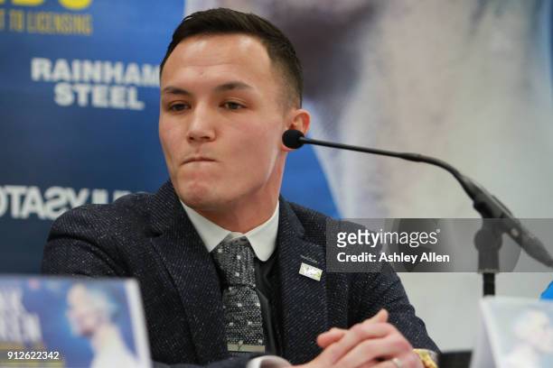 World Featherweight boxer Josh Warrington listens to his challenger IBF World Featherweight Champion Lee Selby during the press conference in the...