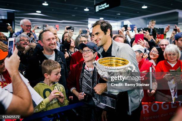 Roger Federer arrives at Airport Kloten with his trophy after winning the 2018 Australian Open Men's Singles Final on January 30, 2018 in Zurich,...