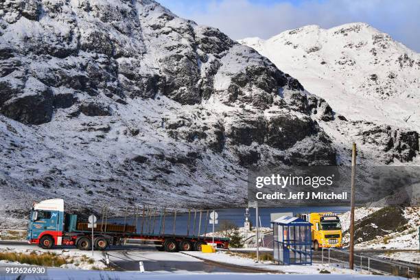 Vehicles park at the top of the A83 Rest and Be Thankful as wintery conditions return on January 31, 2018 in Arrochar, Scotland. Motorists were...