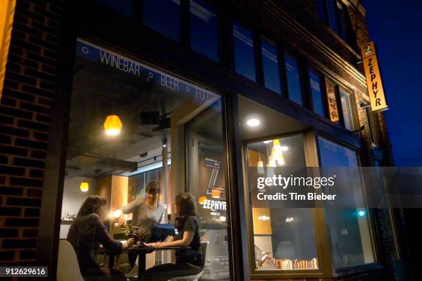 window with diners in cafe restaurant at night - cosy pub stock pictures, royalty-free photos & images