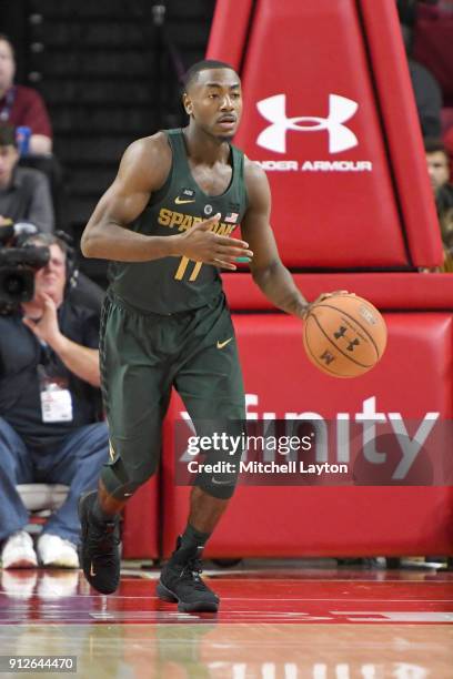 Lourawls Nairn Jr. #11 of the Michigan State Spartans dribbles up court during a college basketball game against the Maryland Terrapins at The...