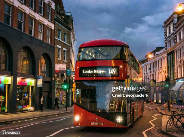 double decker bus in east london - bus front view stock pictures, royalty-free photos & images