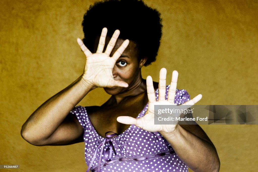 Woman making stop motion with hands