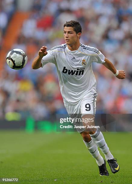 Cristiano Ronaldo of Real Madrid controls the ball during the La Liga match between Real Madrid and Tenerife at the Estadio Santiago Bernabeu on...