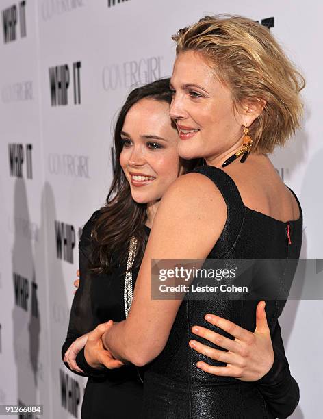 Actress Ellen Page and actress/director Drew Barrymore arrive on the red carpet at the Los Angeles premiere of "Whip It" at the Grauman's Chinese...
