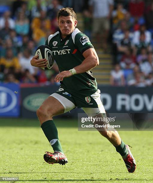 Adam Thompstone of London Irish runs with the ball during the Guinness Premiership match between London Irish and London Wasps at the Madejski...