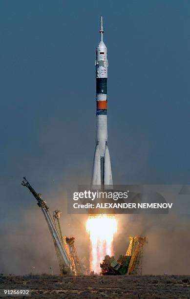 Russian Soyuz TMA-16 rocket with Canadian space tourist and founder of Cirque du Soleil Guy Laliberte, Russian cosmonaut Maxim Surayev and US...