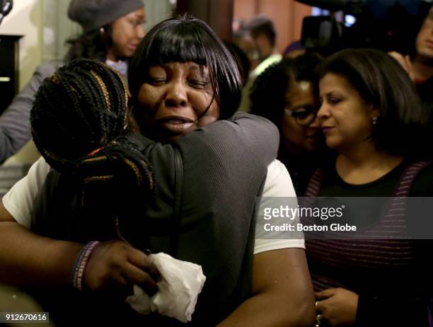 Ursula Ward, the mother of Odin Lloyd, is comforted after she testified at a House Judiciary Committee hearing in favor of legislation intended to...
