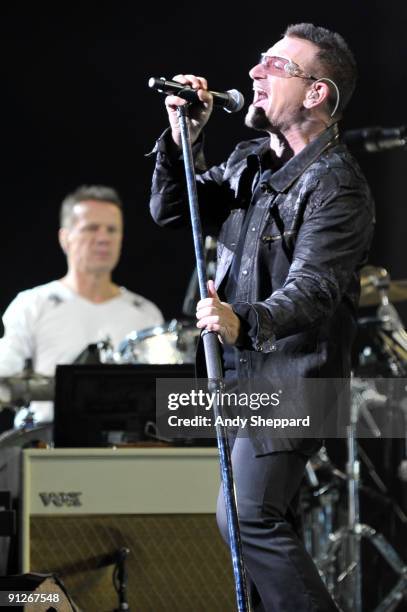 Larry Mullen and Bono of U2 perform on stage at FedExField on September 29, 2009 in Landover, Maryland.