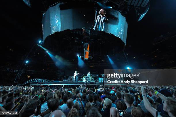 The Edge, Bono and Adam Clayton of U2 perform on stage at FedExField on September 29, 2009 in Landover, Maryland.