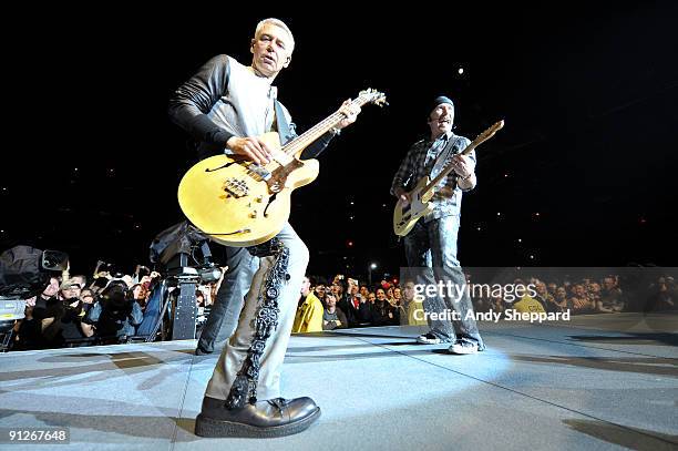 Adam Clayton and The Edge of U2 perform on stage at FedExField on September 29, 2009 in Landover, Maryland.