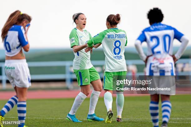 Zsanett Jakabfi and Babett Peter of Wolfsburg celebrate a goal during the Women's friendly match between VfL Wolfsburg and SC Huelva on January 31,...